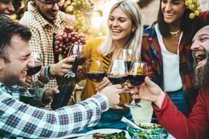 group enjoying wine